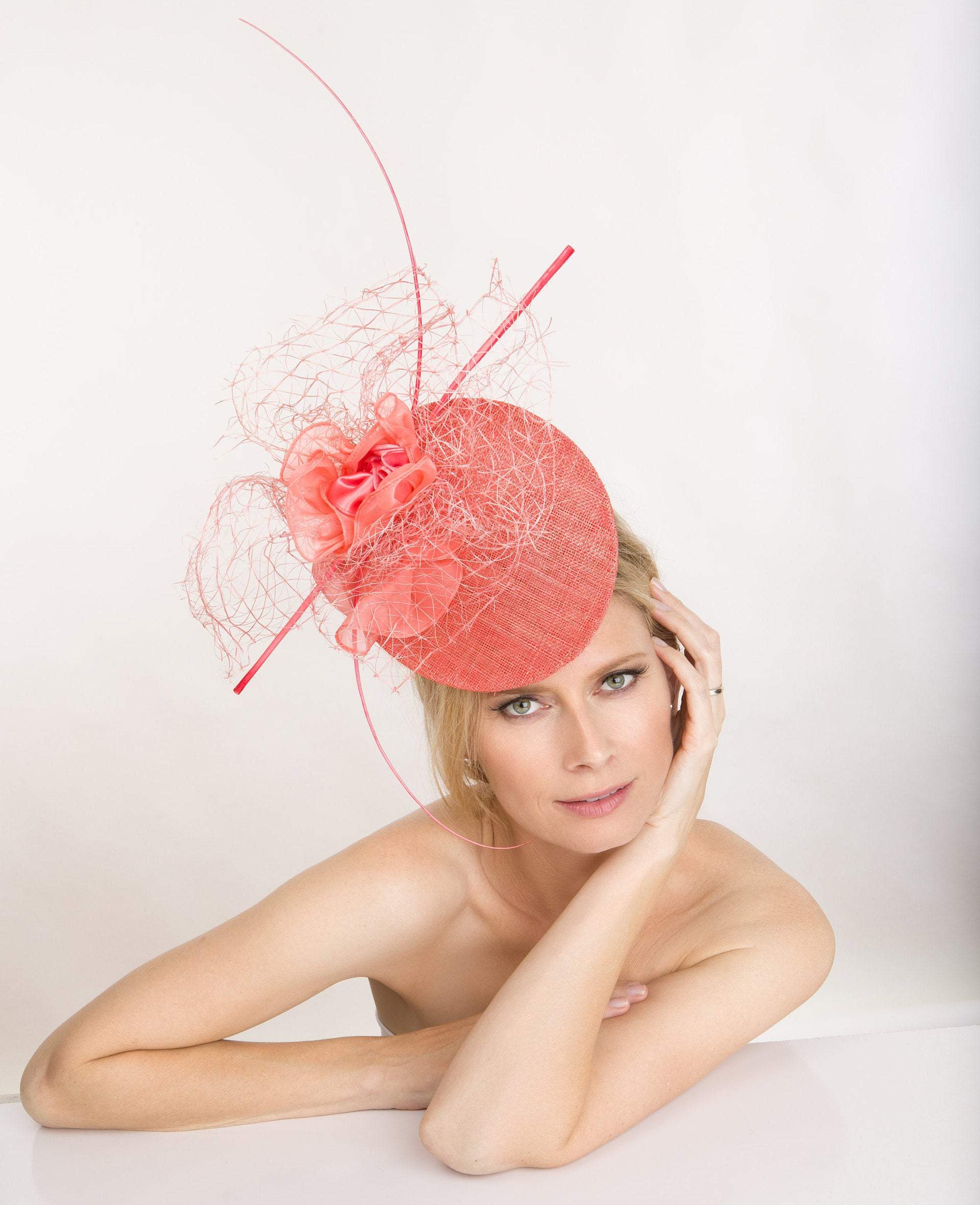2018 collection.Coral Couture Fascinator.Percher hat. Cocktail hat. Derby hat. Kentucky Derby hat, Royal ascot. Designer hat.  Wedding hat.